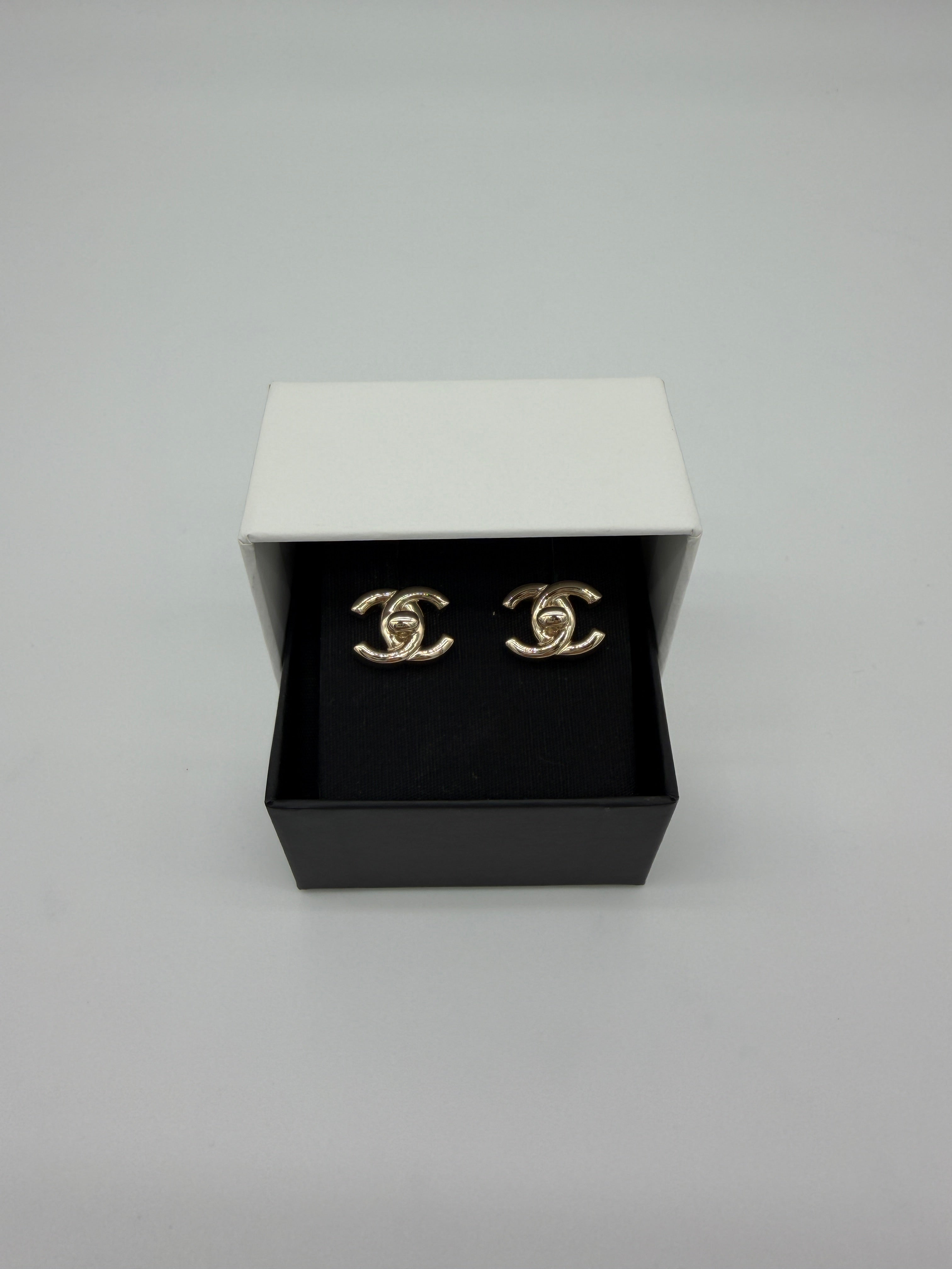 Chanel Turnlock Earrings