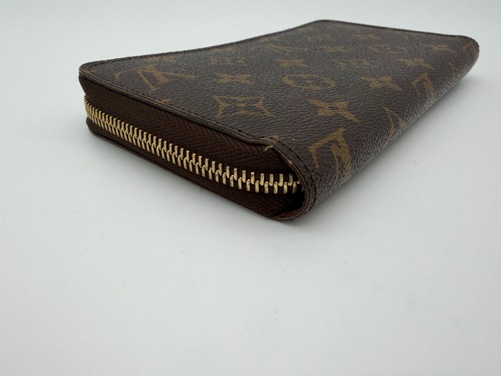 Louis Vuitton Monogram Zippy Wallet.