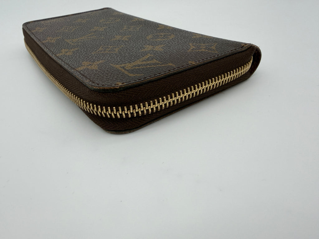 Louis Vuitton Monogram Zippy Wallet.