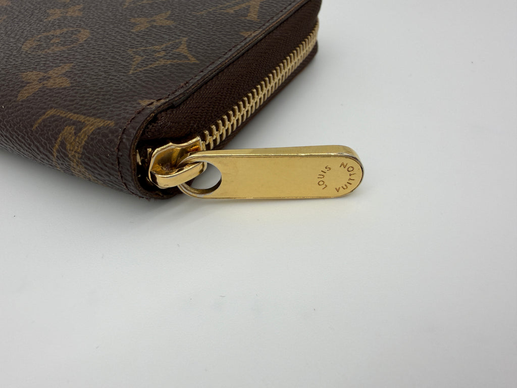Louis Vuitton Monogram Zippy Wallet.
