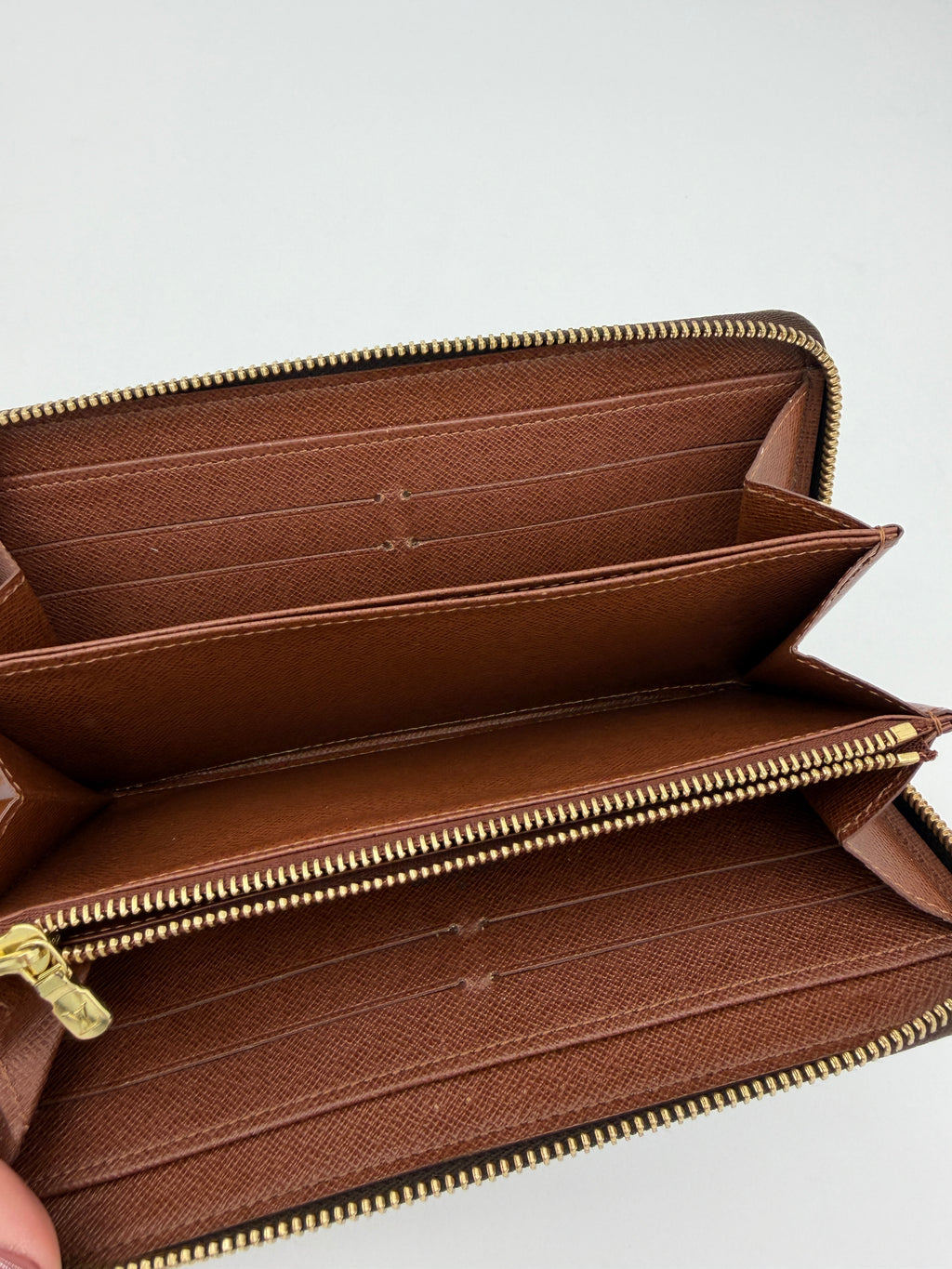Louis Vuitton Monogram Zippy Wallet.