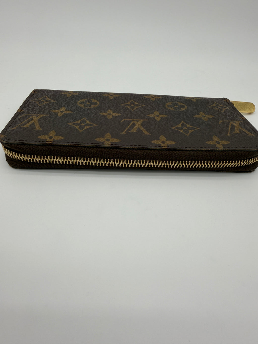 Louis Vuitton Monogram Zippy Wallet.