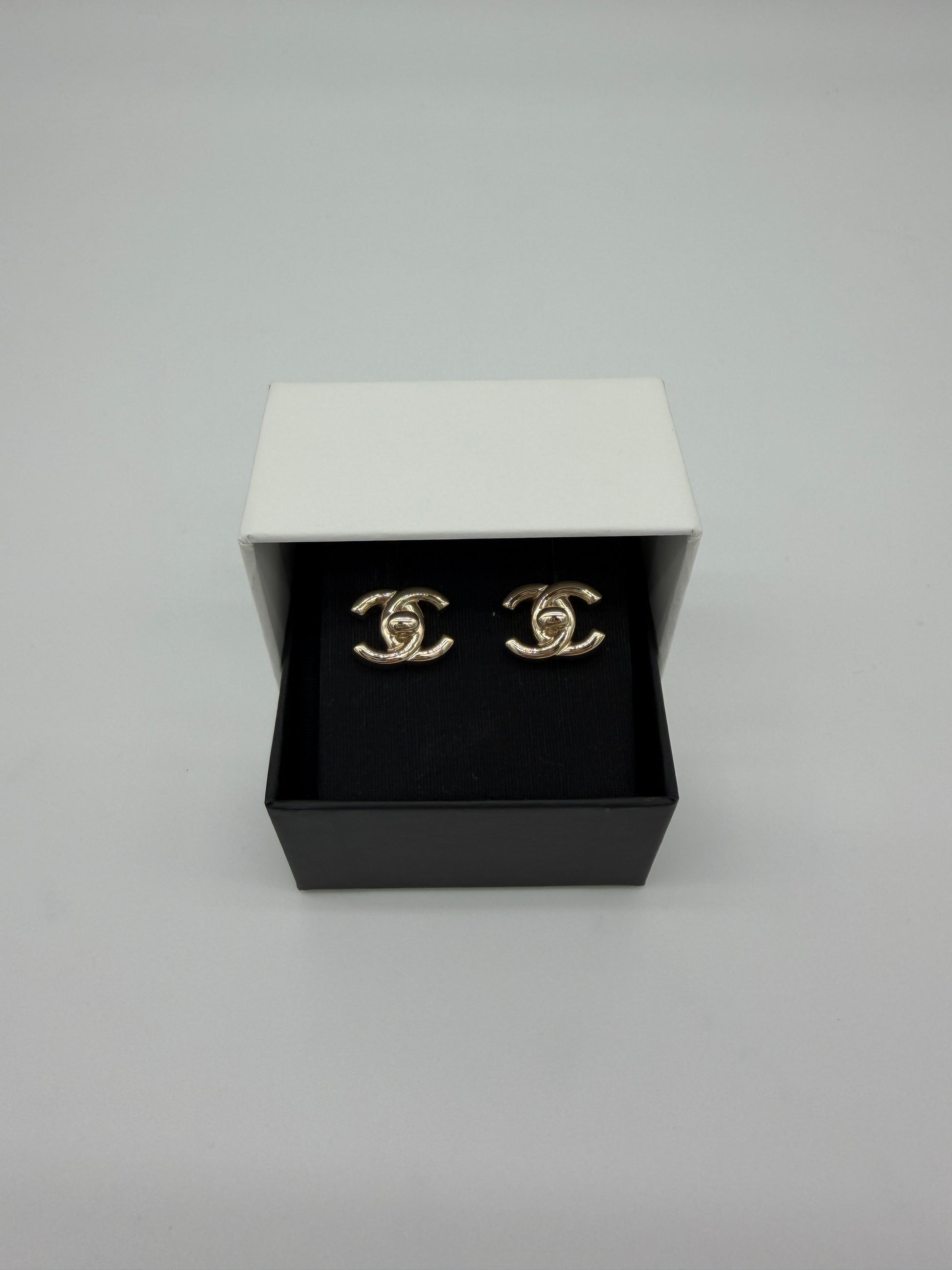 Chanel Turnlock Earrings